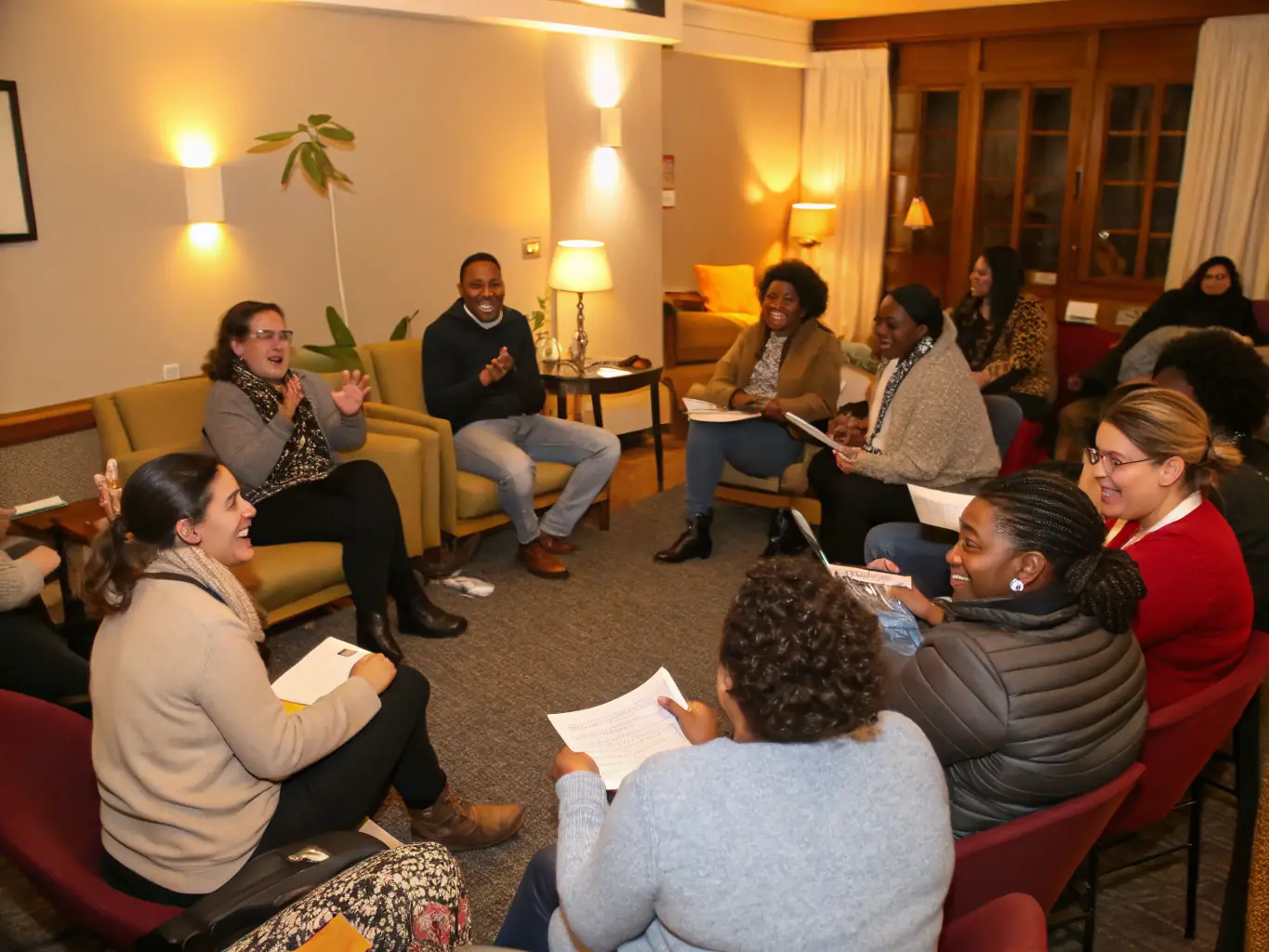 A supportive group of individuals sitting in a circle, sharing their experiences and offering encouragement to one another, facilitated by a trained counselor in a comfortable setting.